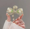 High-end tassel lily of the valley women's hairpin medium-sized, half-tied hair at the back of the head, elegant water diamond bow hairpin headwear, national trend series Specification image